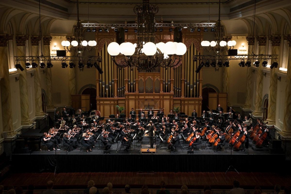 A view from the dress circle of the Adelaide Symphony Orchestra performing on stage in the Auditorium