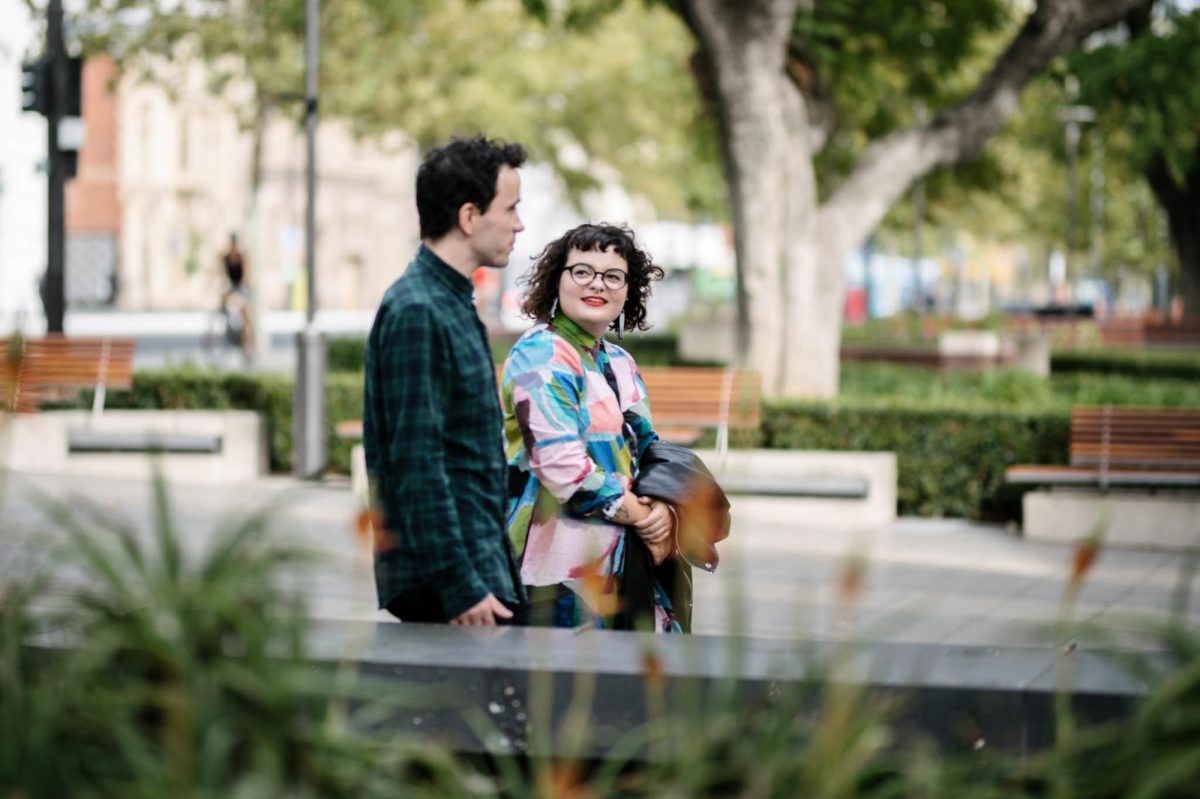 A couple strolling in front of the Art Gallery