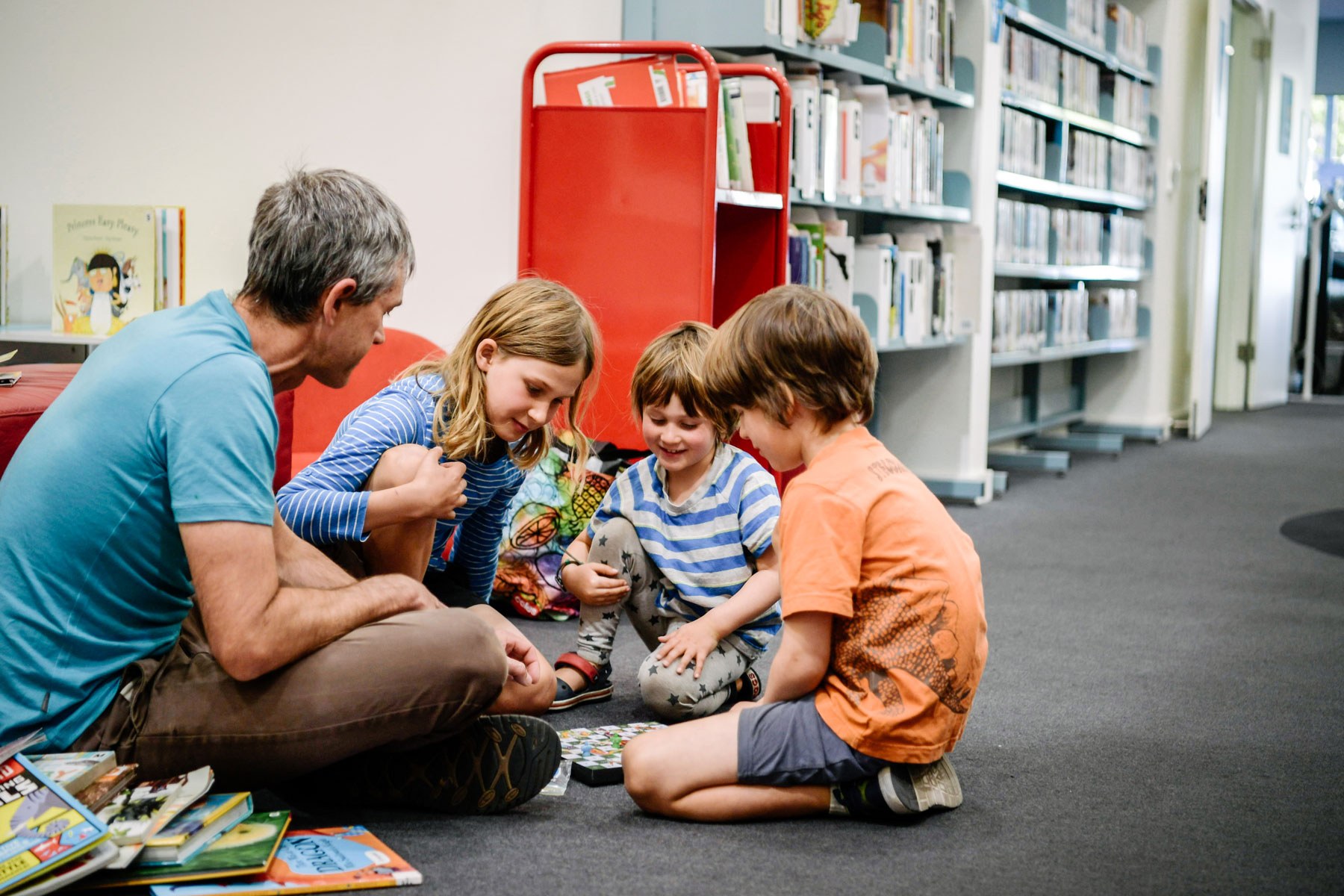Dad and kids at hutt st library