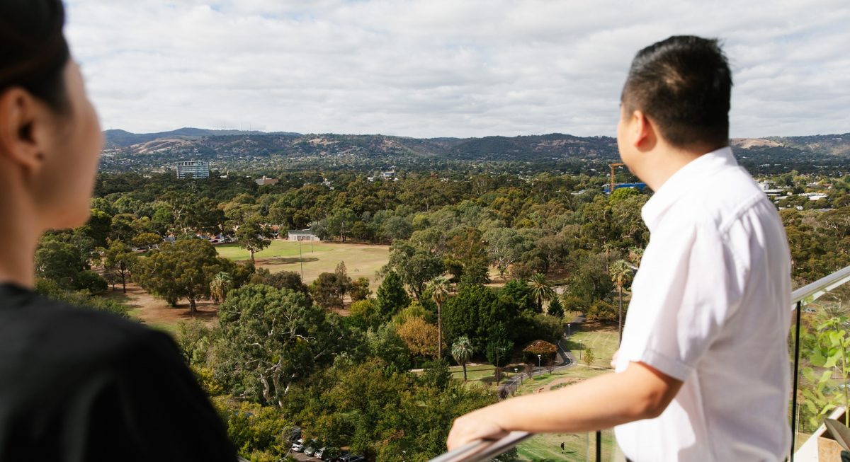 The Zhang family on their city apartment balcony