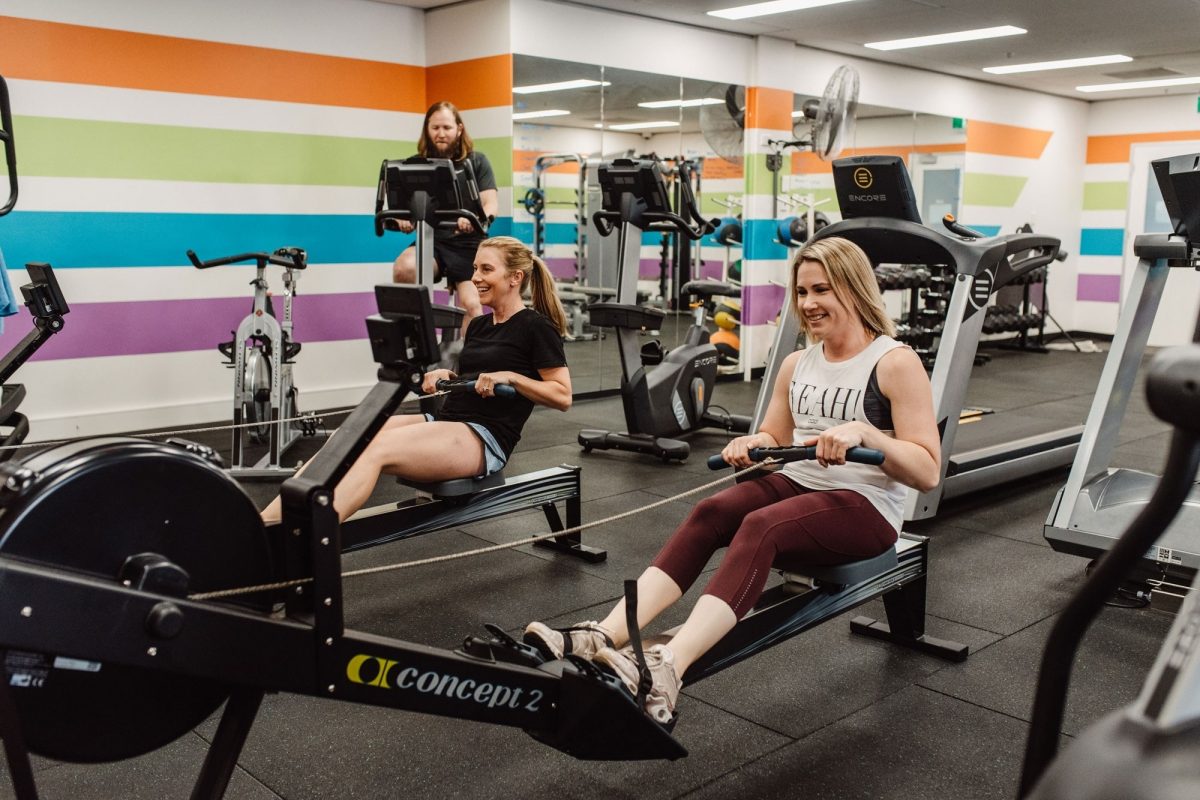 Staff using gym equipment