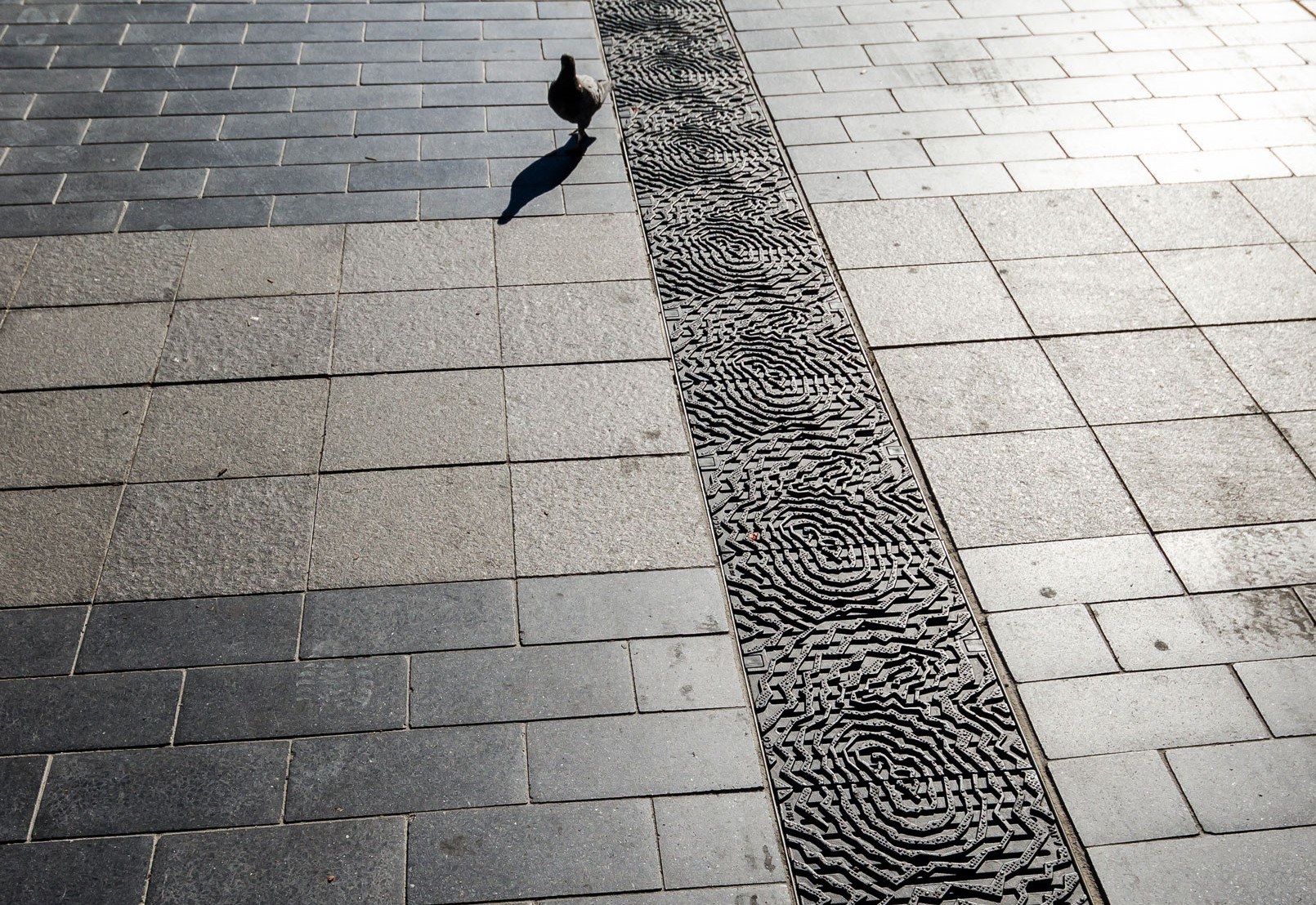 Geode (integrated granite seating and drainage grates) | Art in…